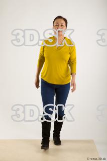 Walking reference of yellow sweater blue jeans Gwendolyn 0001